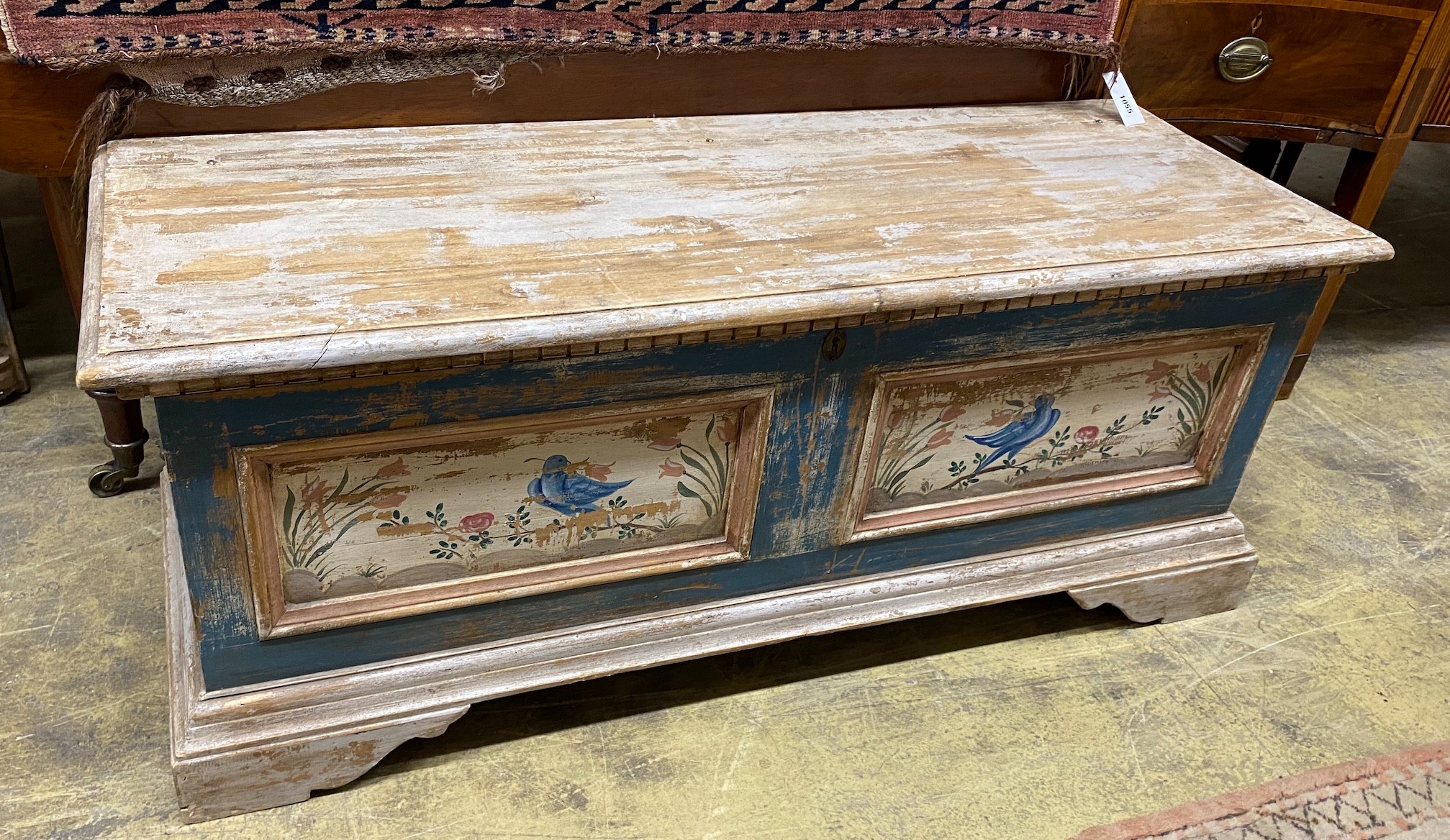 A rectangular Swiss style painted coffer, length 120cm, depth 42cm, height 48cm